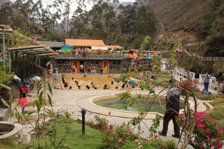 Hiker walking on a mountain trail in the Lares Valley