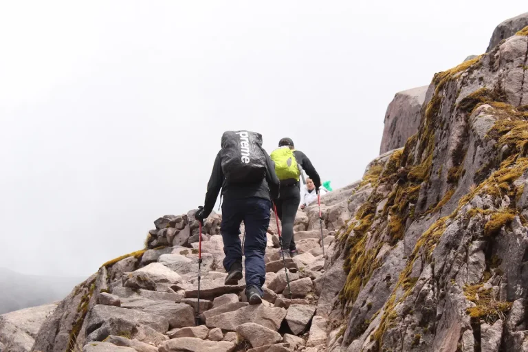 Hiker walking through the Andes on the Lares Trek